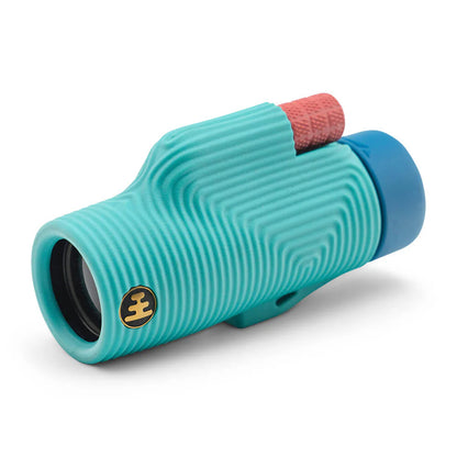 NOCS Provisions Zoom Tube 8x32 Monocular, featuring a rugged, turquoise rubberized grip, red focus wheel, wide field of view, and water-resistant design for adventurous exploration.