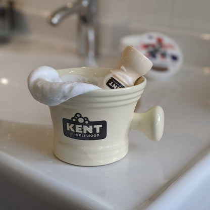 Kent of Inglewood Shaving Mug filled with rich lather, accompanied by a Kent shaving brush, exemplifying classic shaving tools on a bathroom countertop.