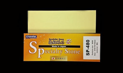 Naniwa Specialty/Super Stone 8000 210x70x10mm whetstone on its box, ideal for intermediate sharpening, smoothing blade scratches for effortless polishing. Great budget-friendly option for casual sharpening.