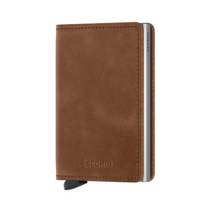 Secrid Wallets Twinwallet in brown leather with an aluminum card protector and lever for easy card access, holds up to 12 cards, cash, and more.