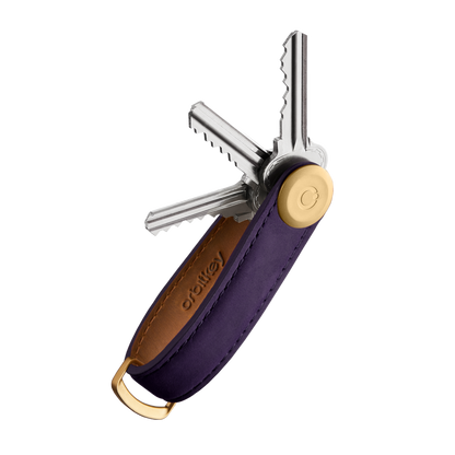 Orbitkey Crazy Horse Leather Key Organizer in purple leather, showcasing pivoted keys on a brass pin, with a D-ring for attachments, emphasizing organized everyday carry.