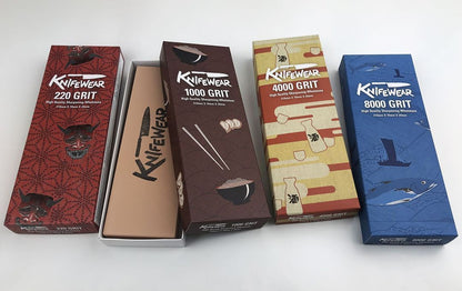 Knifewear 1,000 Grit Sharpening Stone displayed outside its brown sleeve, ideal for refining knife edges with quality and precision.