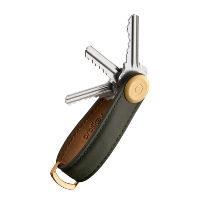 Orbitkey Crazy Horse Leather Key Organizer with brass hardware, showcasing several metal keys fanned out, highlighting its compact and organized design ideal for everyday carry.
