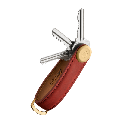 Orbitkey Crazy Horse Leather Key Organizer with red leather sheath, brass pivot, and keys extended; includes a D-ring for attaching larger items.