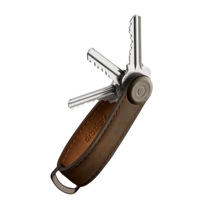 Orbitkey Crazy Horse Leather Key Organizer elegantly stacks and fans up to seven keys, featuring a leather sheath and stainless steel pivot for organized, silent carrying.