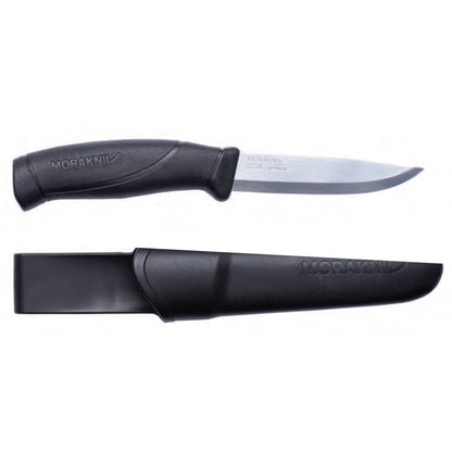 Mora Companion 4 camping knife with black ergonomic handle and matching sheath, ideal for bushcraft, carving, and camping, showcasing robust, functional design.