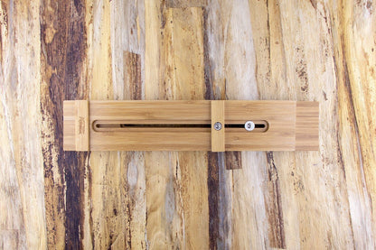 Knifewear Sharpening Sink Bridge shown with bamboo jig, featuring adjustable stop block and screws for precision in sharpening, fitting most sinks for safe, efficient use.
