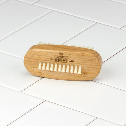 Kent of England Aqua Nail Brush with natural bristles on both sides, ideal for cleaning and detailing under nails, crafted by renowned brushmaker Kent.