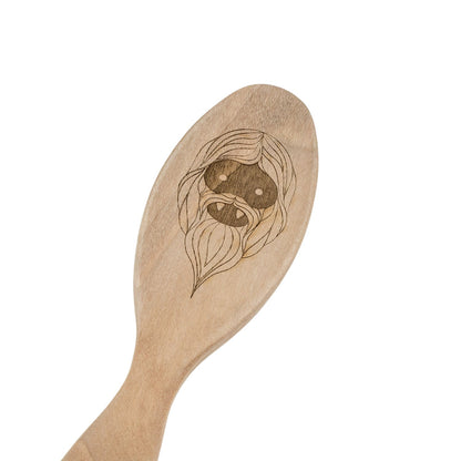 Kent of England Monster Beard Brush BRD5, featuring a wooden paddle design with a stylized etched face, crafted to soften and manage beards with horse and nylon bristles.