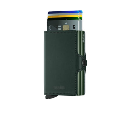 Secrid Wallets Twinwallet showcasing a slim aluminum card-holder with RFID protection, partially fanned cards, and a stylish leather cover for organized card storage.