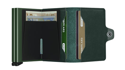 Secrid Wallets Twinwallet, a sleek money clip wallet, holds euro notes and credit cards with a snap closure and RFID protection, showcasing Dutch craftsmanship.
