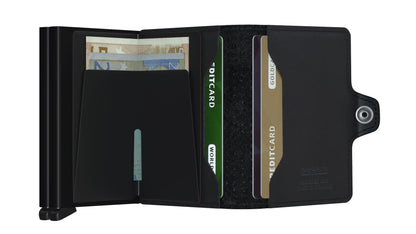 Secrid Wallets Twinwallet, showcasing an open design with an aluminum card protector, Euro bills, and card slots, blending style and functionality with RFID protection.