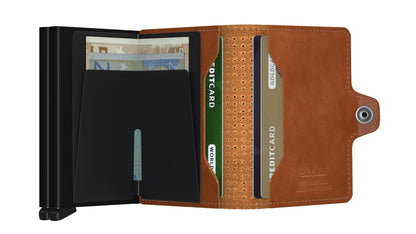 Secrid Wallets Twinwallet with a black card protector and brown leather cover, featuring a lever for card access, designed for optimal organization and RFID protection.