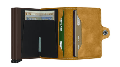 Secrid Wallets Twinwallet: Bifold design holds 10-12 cards, cash, and business cards with RFID blocking and Secrid's innovative card pop-out feature for organized functionality.