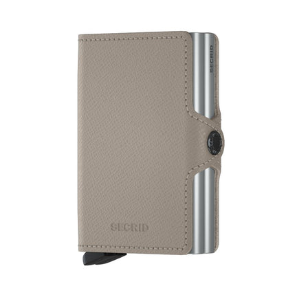 Secrid Wallets Twinwallet in textured leather with an aluminum Cardprotector spine, featuring a lever for easy card access and RFID blocking. Hand-made in Holland.