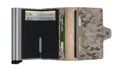 Secrid Wallets Twinwallet showcasing an open design with a metal money-clip holding euros and camo-pattern leather with card pockets, perfect for organized card storage.