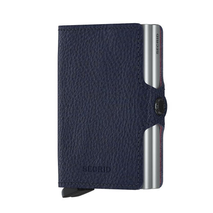 Secrid Wallets Twinwallet in navy leather with aluminum shell, designed to hold 10-12 cards, cash, and business cards. RFID blocking, stylish pop-out lever.