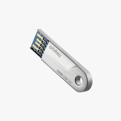 Orbitkey USB 32 GB, key-shaped and slim, designed for convenience with fast USB 3.0 transfer, embodies Kent of Inglewood's practical daily organization philosophy.