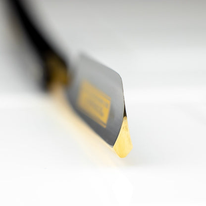 Dovo Bismarck Straight Razor 6/8” close-up showing the black tool holder and shiny, triangular carbide insert, highlighting craftsmanship for optimal metal-cutting precision.