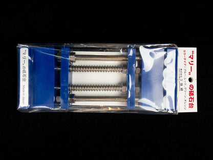 Stone Holder Spring Loaded, a blue plastic and metal jig by Marie, secures whetstones effortlessly with its spring mechanism, ideal for precise knife sharpening. Made in Japan.