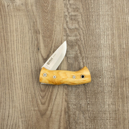 Helle Knives Kletten 55m Folding Knife on wood surface, featuring a light wood handle and partially open stainless steel blade with maker’s mark.