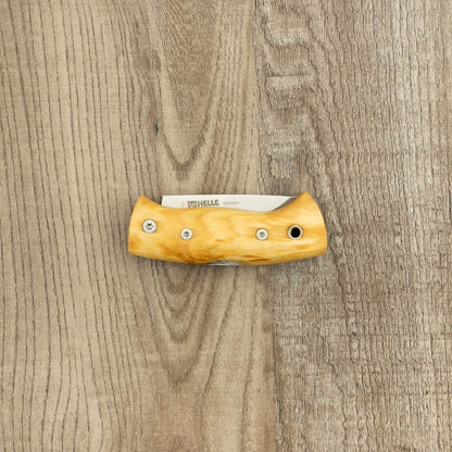 Helle Knives Kletten 55m Folding Knife, showcasing its birch-like handle and partially folded stainless blade, ideal for everyday carry and small adventures.