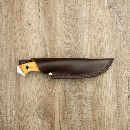 Helle Knives Utvaer 100mm Hunting Knife, a sturdy fixed-blade with a light-wood handle, sheathed in leather, ideal for tough outdoor tasks.