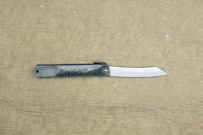 Higo Knife with a metal handle featuring Japanese characters and a straight-edged blade, crafted by Mitsuo Nagao using traditional techniques.
