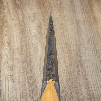 Hultafors Hult Splitting Axe with American hickory handle and sharpened Swedish carbon steel head on timber floor, designed for efficient log splitting.