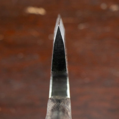 Close-up of Mizuno Jigata Masakari Bearded Hatchet, showcasing its thick bevel and handle, ideal for splitting and woodworking.