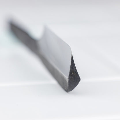 Close-up of Takami Kamisori Japanese Straight Razor Western Grind's beveled edge, showcasing its precise craftsmanship and innovative blend of Japanese and Western design.