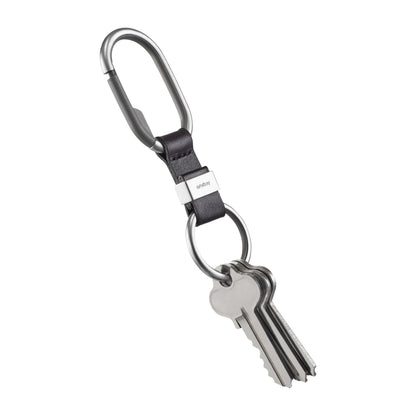 Orbitkey Clip with leather strap and key ring, featuring several steel keys, designed for easy carrying and organization of personal items.