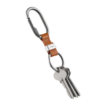 Orbitkey Clip featuring a metal carabiner, leather strap, and key ring with house keys; designed for organized, stylish everyday carry.
