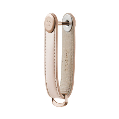 Orbitkey Leather Key Organizer with stitched leather panels, central screw for stacking 2-7 keys, and a metal D-ring for attaching larger items.