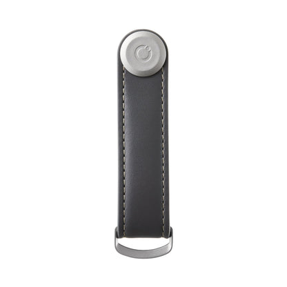 Orbitkey Leather Key Organizer with snap-button closure and D-ring for attaching larger items, designed to hold and organize 2-7 keys compactly in leather.