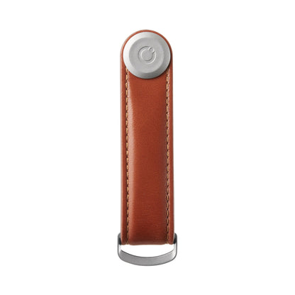 Orbitkey Leather Key Organizer with stitched brown leather, metal fastener, and D-ring, designed to hold 2-7 keys neatly and silently.
