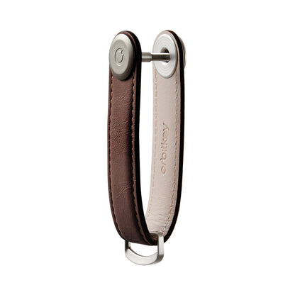 Orbitkey Leather Key Organizer: A sleek, U-shaped leather tool efficiently secures 2-7 keys, with a D-ring for larger items, enhancing pocket organization.