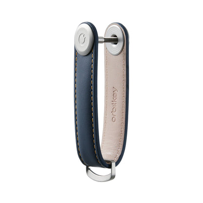 Orbitkey Leather Key Organizer with U-shaped strap neatly stacks 2-7 keys, featuring a metal post and D-ring for attaching larger items.