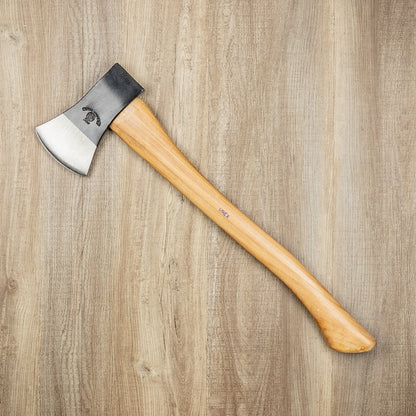 Ox-Head 1.75 Lb Axe with polished steel head and smooth curved wooden handle, ideal for camping and backyard chopping, laid on a wood surface.