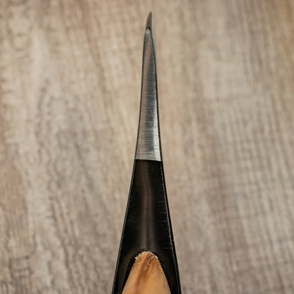 Ox-Head 1.75 Lb Axe's finely honed blade tip with black bolster and wooden handle, highlighting its precision design for versatile chopping tasks.