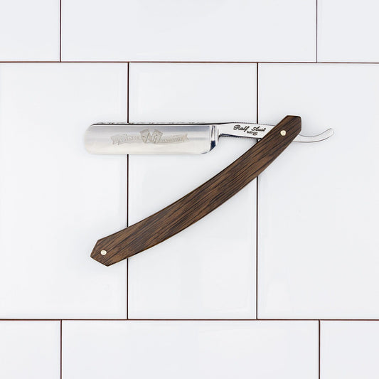 Ralf Aust Round Point 5/8 Straight Razor with a polished Solingen steel blade and smoked oak handle, perfect for traditional shaving enthusiasts.