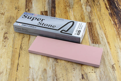Naniwa Specialty/Super Stone 3000, 210x70x20mm, shown with its retail box on a wooden tabletop, ideal for refined sharpening without excessive steel removal.