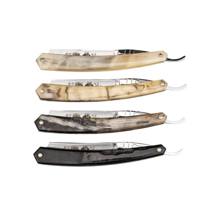 Thiers Issard Straight Razor, Gold Medallion Rams Horn, 5/8, featuring horn handles and folding blades stamped with “Médaille d’Or,” embodying classic elegance and craftsmanship.