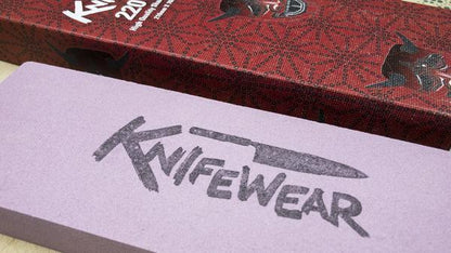 Knifewear 220 Grit Sharpening Stone, ideal for serious chip removal and bevel-setting, displayed alongside its packaging in Kent of Inglewood's premium range.